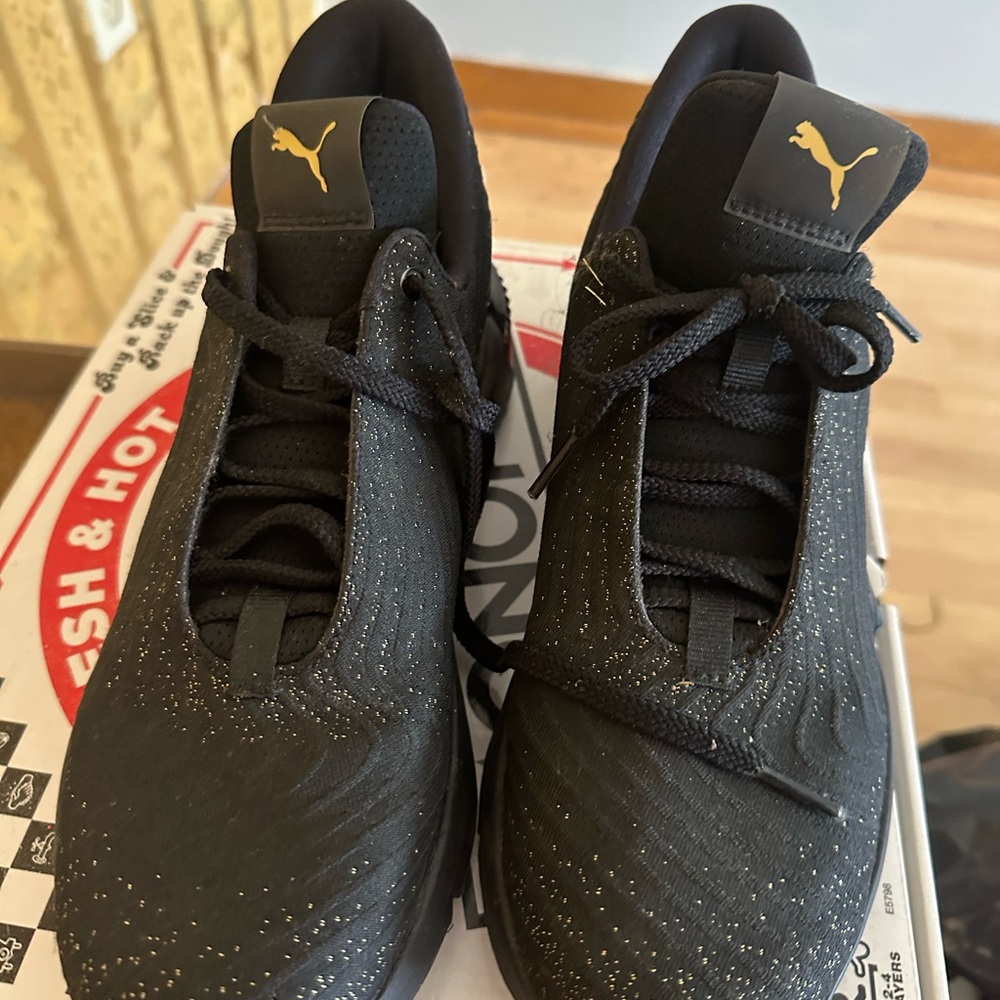 Puma Black Sneakers with Gold Logo